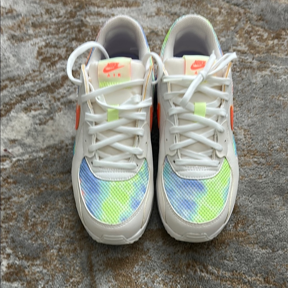 Nike White and Blue Sneakers with Classic Design
